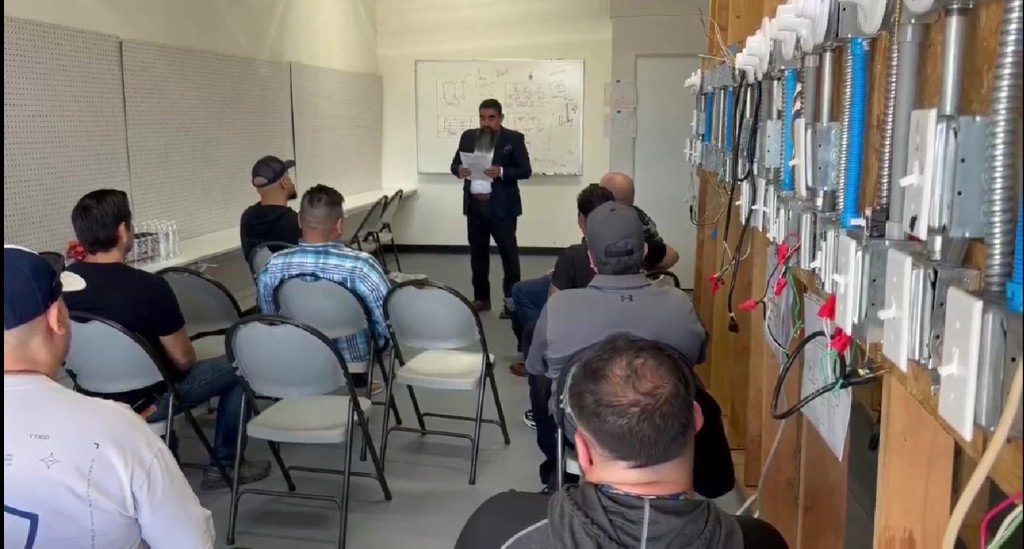 FMWC electrical training instructor presenting to participants in a classroom