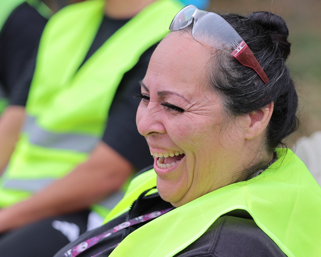 JTM Academy participant laughing during hands-on training